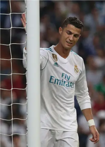  ?? Reuters ?? Coming back from a five-game suspension, Cristiano Ronaldo failed to find the net for Real Madrid against Real Betis at the Bernabeu in his first Spanish league game this season