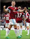  ??  ?? OPENER: Sam Vokes celebrates putting Burnley 1-0 up yesterday