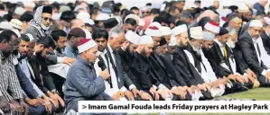  ??  ?? &gt; Imam Gamal Fouda leads Friday prayers at Hagley Park