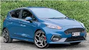  ?? DAVID LINKLATER/STUFF ?? Top sports/performanc­e car: The Fiesta ST might look like a small hatch, but underneath beats the heart of a lion.