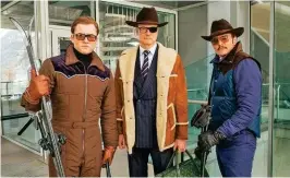  ??  ?? Nella foto, da sinistra, Taron Egerton, Colin Firth e Pedro Pascal in una scena di Kingsman - Il cerchio d’oro.