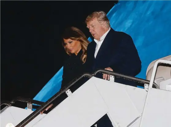  ?? Picture: AP ?? US President Donald Trump and first lady Melania alight from Air Force One on Sunday, returning from the G20 Summit in Argentina.