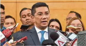  ?? PIC BY MOHAMAD SHAHRIL BADRI SAALI ?? Economic Affairs Minister Datuk Seri Azmin Ali at the Parliament lobby yesterday.