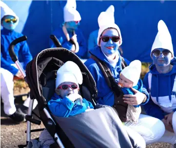  ??  ?? Participan­ts pose during a gathering of people dressed as smurfs to be counted as part of a world record attempt on in Lauchringe­n, Germany. — AFP photo