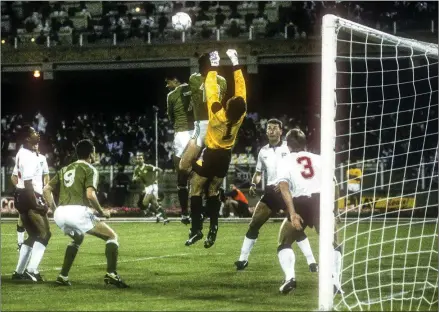  ??  ?? Paul McGrath and Niall Quinn apply pressure on England goalkeeper Peter Shilton from a setpiece during their opening clash of the 1990 World Cup finals in Cagliari, Ireland’s first-ever game at that level.