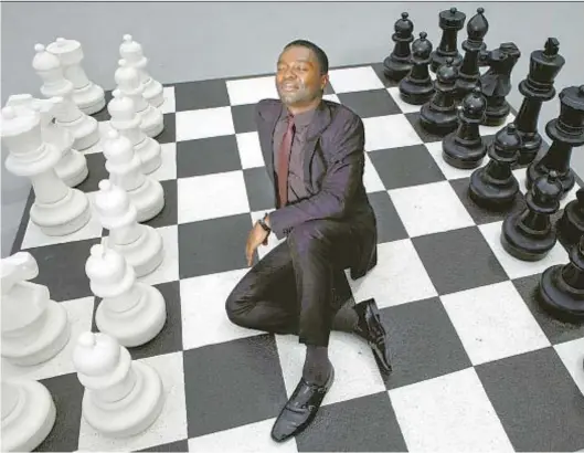  ?? Genaro Molina
Los Angeles Times ?? DAVID OYELOWO says, “One thing I refuse to do is relax.” It’s his turn, on a chess set at the London West Hollywood.