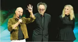  ?? CHRIS PIZZELLO/AP ?? Michael Keaton, from left, Tim Burton and Catherine O’Hara discuss the upcoming film “Beetlejuic­e Beetlejuic­e” on Tuesday at CinemaCon 2024 in Las Vegas.