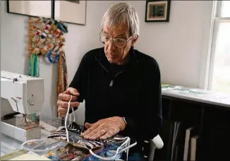  ?? CAROLINE GUTMAN COURTESY OF ?? Joe Cunningham, shown sewing a mask, hosted his first online class during the pandemic.