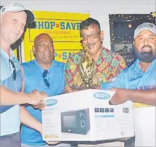 ?? Picture: MAIKA KASAMI/SUPPLIED ?? Filipe Marayawa is a former The Fiji Times sports journalist who now resides in New Zealand.
Defending Shop N Save Lautoka Open golf champion James Pridgeon receives a consolatio­n prize from Reginal Ram and the sponsors at the Lautoka Golf Club last
Year.
