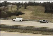  ?? READING EAGLE — MEDIANEWS GROUP ?? A Berks County coroner’s office van was called to the scene of a crash Saturday afternoon, Jan. 21, on the embankment below ramps from the Warren Street Bypass to the eastbound West Shore Bypass (Route 422) in Wyomissing.