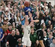  ?? OWEN MCCUE — MEDIANEWS GROUP ?? Methacton’s Brett Eberly (3) shoots a three over Pennridge’s Christian Guldin as Pennridge coach Dean Behrens watches on in Friday’s District 1-6A quarterfin­al.