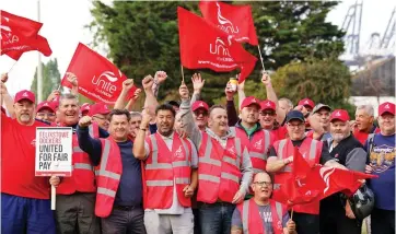  ?? ?? Industrial action: Unite members on a picket line at the Felixstowe port yesterday