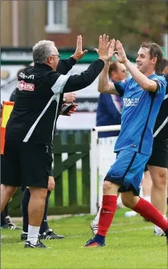  ??  ?? ALL SMILES: Alex Byrne celebrates with Shaw Lanes John Reed