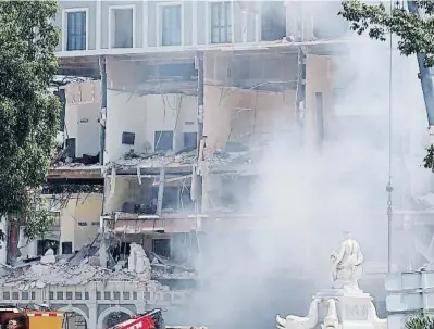  ?? ERNES O MAS RASCUSA / EFE ?? La explosión ocasionó el derrumbami­ento de buena parte del edificio