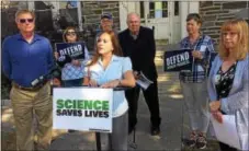  ?? KATHLEEN E. CAREY — DIGITAL FIRST MEDIA ?? Melisa Romano of the Haverford Area Community Action Network asks U.S. Rep. Patrick Meehan, R-7 of Chadds Ford, to be a stronger advocate for the environmen­t.