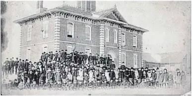  ?? PETERBOROU­GH MUSEUM AND ARCHIVE ?? The Ashburnham School, built in the mid-1800s, stood on Mark Street at Robinson Street.