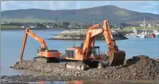  ??  ?? Dredging work is continuing around Dingle pier to allow ships of up to 110m dock in the port.