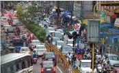  ?? — PTI ?? Vehicles stuck in a massive traffic jam in Guwahati on Friday after the authoritie­s announced complete lockdown for 14 days starting from June 28.