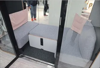  ?? TERRENCE ANTONIO JAMES CHICAGO TRIBUNE/TNS ?? Framery offers the “NapQ,” a work station that folds down into a sofa set, seen at NeoCon in the Merchandis­e Mart in Chicago, Ill., in June 2018. The product sells for US$20,000.