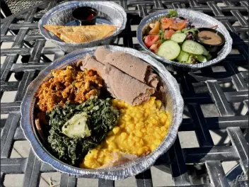  ?? PROVIDED BY OH HEY CREATIVE ?? Konjo Ethiopian Food’s $35 Restaurant Week menu features a mixed green salad and your choice of seasoned veggie, chicken or beef tibs combos.