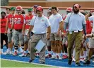  ?? STAFF DAVID JABLONSKI / ?? Dayton’s Mark Ewald (left) coaches during a game against Eastern Illinois last season.