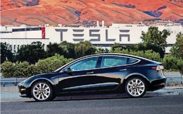 ?? [PHOTO PROVIDED] ?? Tesla is expanding its service operations and hiring more than 1,000 technician­s to meet expected demand for its new Model 3 sedan.