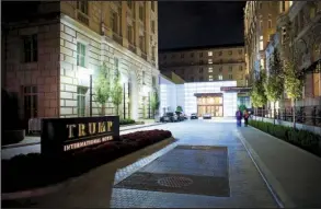  ?? The New York Times/CHAD BARTLETT ?? The Trump Internatio­nal Hotel, a $200 million accommodat­ion inside the federally owned Old Post Office building near the White House, is a luxe environmen­t for lobbyists and others who want to rub elbows with Trump-related politicos.