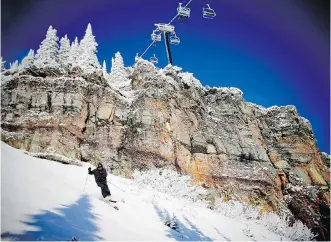  ?? AL CHAREST ?? Ronny Road Trip Foster skis down a run called Whitey’s under Chair 5 at Whitefish Mountain Resort, in northwest Montana. The snowy resort is celebratin­g its 70th anniversar­y and has planned a number of events to commemorat­e the milestone. The move of...