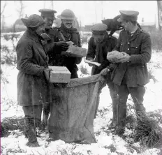  ??  ?? Respite: Soldiers receive Christmas letters at the front