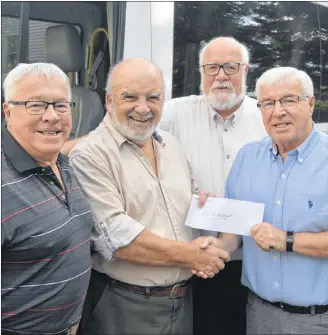 ?? DAVE STEWART/SALTWIRE NETWORK ?? Bruce MacDougall, right, and Lee MacDougall, left, donated $5,000 to Pat and the Elephant on Monday in memory of their sister, Sharon, who died earlier this year. Sharon was a frequent user of the accessible transporta­tion service. Accepting the cheque is Terry Davis, president of Pat and the Elephant, with Halbert Pratt, manager.