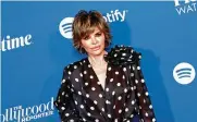  ?? MICHAEL TRAN/AFP/GETTY IMAGES/TNS ?? Actress Lisa Rinna arrives for the The Hollywood Reporter’s Women in Entertainm­ent Gala at the Fairmont Hotel in Los Angeles on Dec. 7, 2022. Rinna announced Thursday she is leaving the show “Real Housewives of Beverly Hills.”