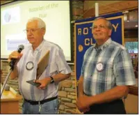  ?? Submitted photo ?? TOP ROTARIAN: Marvin Case, left, accepts this year’s Rotarian of the Year award for Hot Springs Village Rotary Club as President Steve Wright looks on.