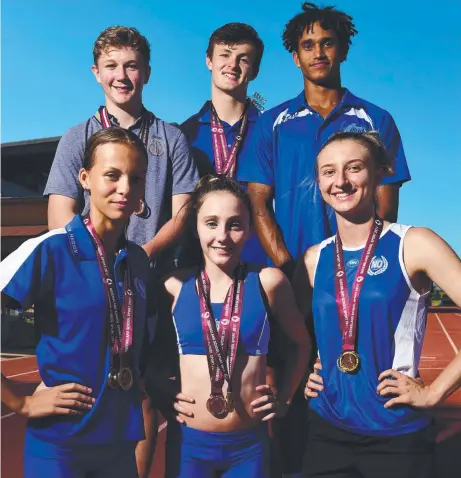  ?? POWERFUL PERFORMANC­ES: Townsville athletics stars ( back) Ashley Thomas, 13, Jake Doran, 17, Samuel Warner, 17, with ( front) Isabella Starr, 13, Lauren Nugent, 14, Kajsa Souter, 16, have been selected to represent Queensland. Picture: SCOTT RADFORD- CHIS ??