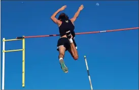  ?? TIM GODBEE / For the Calhoun Times ?? Calhoun’s Jack Rhea clears 15-00 in the pole vault during Wednesday’s track meet between the Jackets, Cass and Coosa.