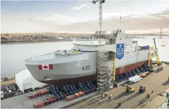  ?? IRVING SHIPBUILDI­NG INC. VIA CP ?? Work proceeds Friday on HMCS Harry DeWolf, the Canadian Navy’s first Arctic patrol ship, at Irving Shipbuildi­ng’s Halifax Shipyard. A threatened strike could slow progress.