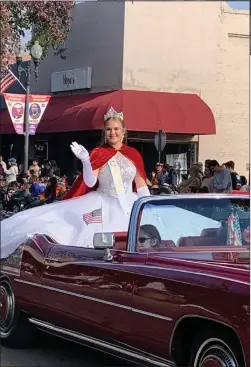  ?? RECORDER PHOTO BY ESTHER AVILA ?? Miss Portervill­e Kyleen Mitchell waves to the crowd at the Veterans Day Parade on Thursday.