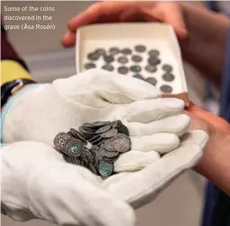  ?? ?? Some of the coins discovered in the grave (Åsa Rosén)