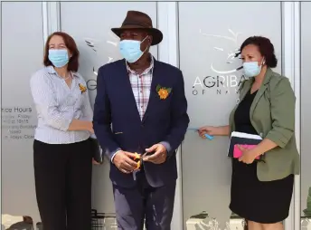  ?? ?? Open for business… Agribank’s Dagmar Honsbein, acting chief regional officer of Omaheke, Karukirue Tjijenda and Gobabis mayor Elvire Theron at the bank’s branch opening in Gobabis.