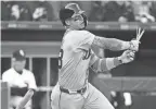  ?? KAMIL KRZACZYNSK­I/USA TODAY SPORTS ?? Javier Báez breaks his bat during the ninth inning against the White Sox on March 28 in Chicago.