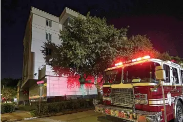  ?? AP Photo/David J. Phillip ?? ■ A firetruck is positioned outside the Chinese Consulate on Wednesday in Houston. Authoritie­s responded to reports of a fire at the consulate. Witnesses said that people were burning paper in what appeared to be trash cans, according to police. China says the U.S. has ordered it to close its consulate in Houston in what it called a provocatio­n that violates internatio­nal law.