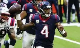  ??  ?? Houston Texans quarterbac­k Deshaun Watson looks to throw during a November game against the New England Patriots. Photograph: David J Phillip/AP