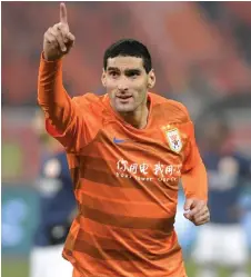  ?? — AFP photo ?? Marouane Fellaini of Shandong Luneng celebratin­g after scored during the Chinese Super League match between Shandong Luneng and Beijing Renhe in Jinan in China’s eastern Shandong province in this March 1, 2019 file photo.