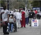  ?? AP FILE ?? BALLOT LINE: People wait in line for early voting in Augusta, Ga., during the 2020 election.