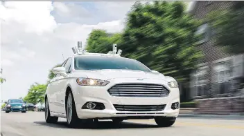  ?? FORD ?? Ford promises an autonomous, ride-sharing car, without a steering wheel or brake pedal, by 2021.