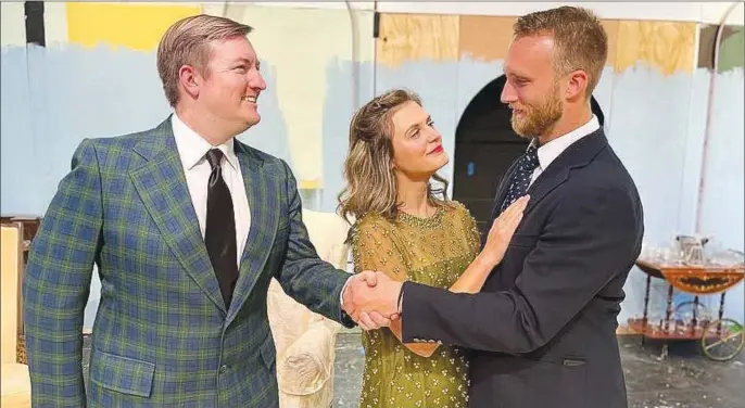  ?? (Courtesy Photo/FSLT) ?? Among the complicati­ons at the wedding of socialite Tracy Lord (Grace Andrews, center) are the arrival of a journalist (played by Eric Wells, left) and Tracy’s charming and still devoted ex-husband C.K. Dexter Haven (Christian Meurer, right).