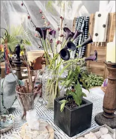  ??  ?? The New York City’s Open Storefront­s initiative lets retailers use sidewalk space in a manner similar to restaurant­s, but few businesses have applied. Here plants, crystals, salts and other items are for sale in an open-air area in Brooklyn.
