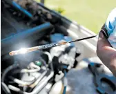  ?? DARREN BREEN/AP ?? Among the trends that are making do-it-yourselfer­s a rarer breed: Oil change intervals are growing longer, and transmissi­on fluids are expected to last the life of the car.