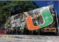  ?? CONTRIBUTE­D BY NBC 6 ?? A mural in Wynwood shows off a new attitude about the Hurricanes, who will carry the longest winning streak in the country — 13 — into tonight’s game against Notre Dame.