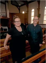  ??  ?? Erana Watkins and minister John Wilkie are welcoming people into the Ha¯wera Presbyteri­an church for some time out from ‘‘the busyness of Christmas’’.