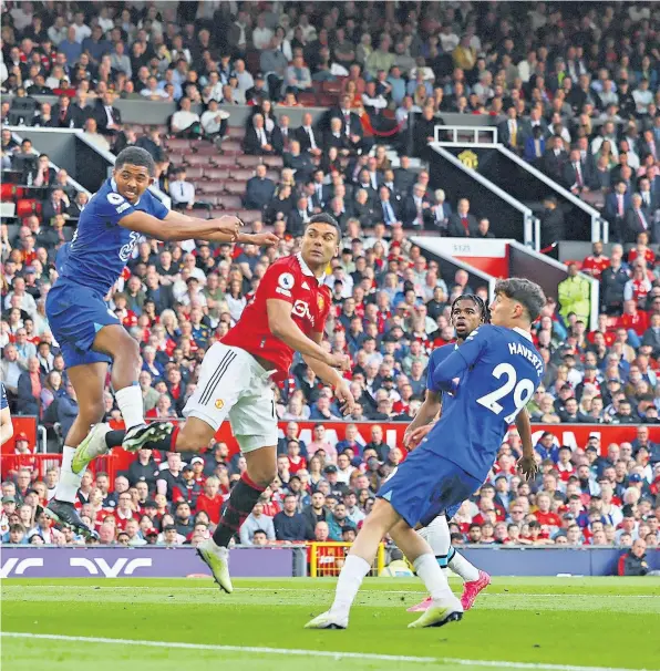  ?? ?? Rising and falling: Casemiro heads in Manchester United’s opener (above); Antony is taken off on a stretcher after a first-half injury